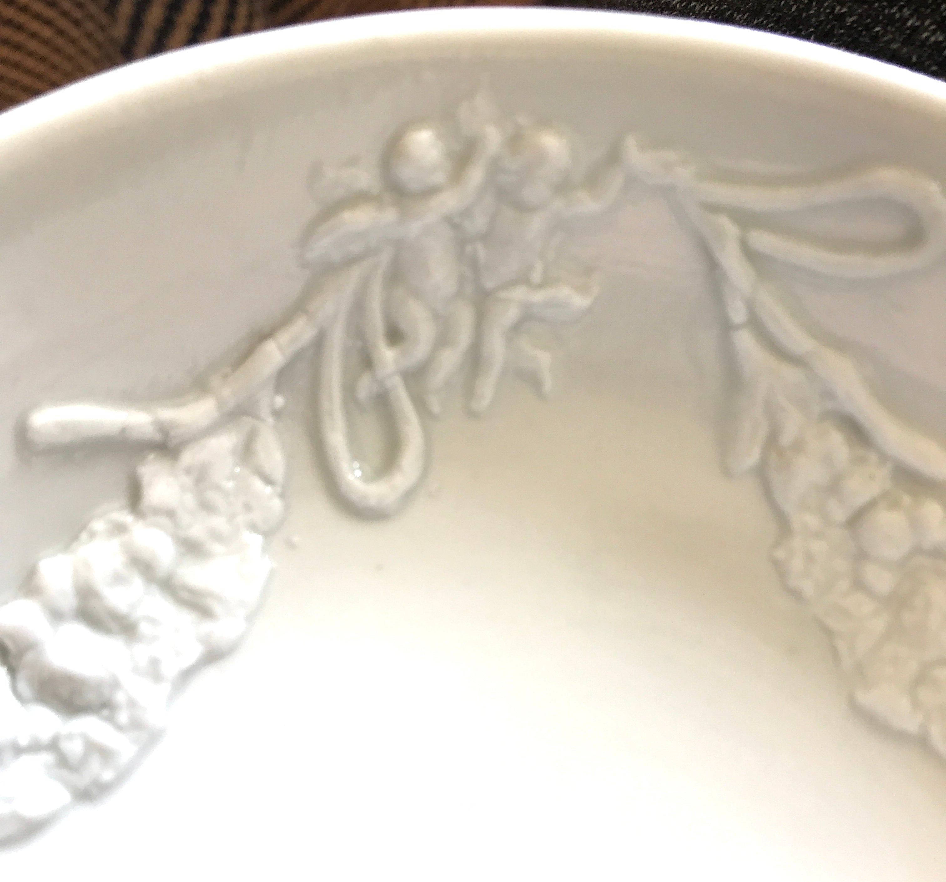 Sold 18th Century Doccia Porcelain Saucer with Swags and Festoons and Putti.
